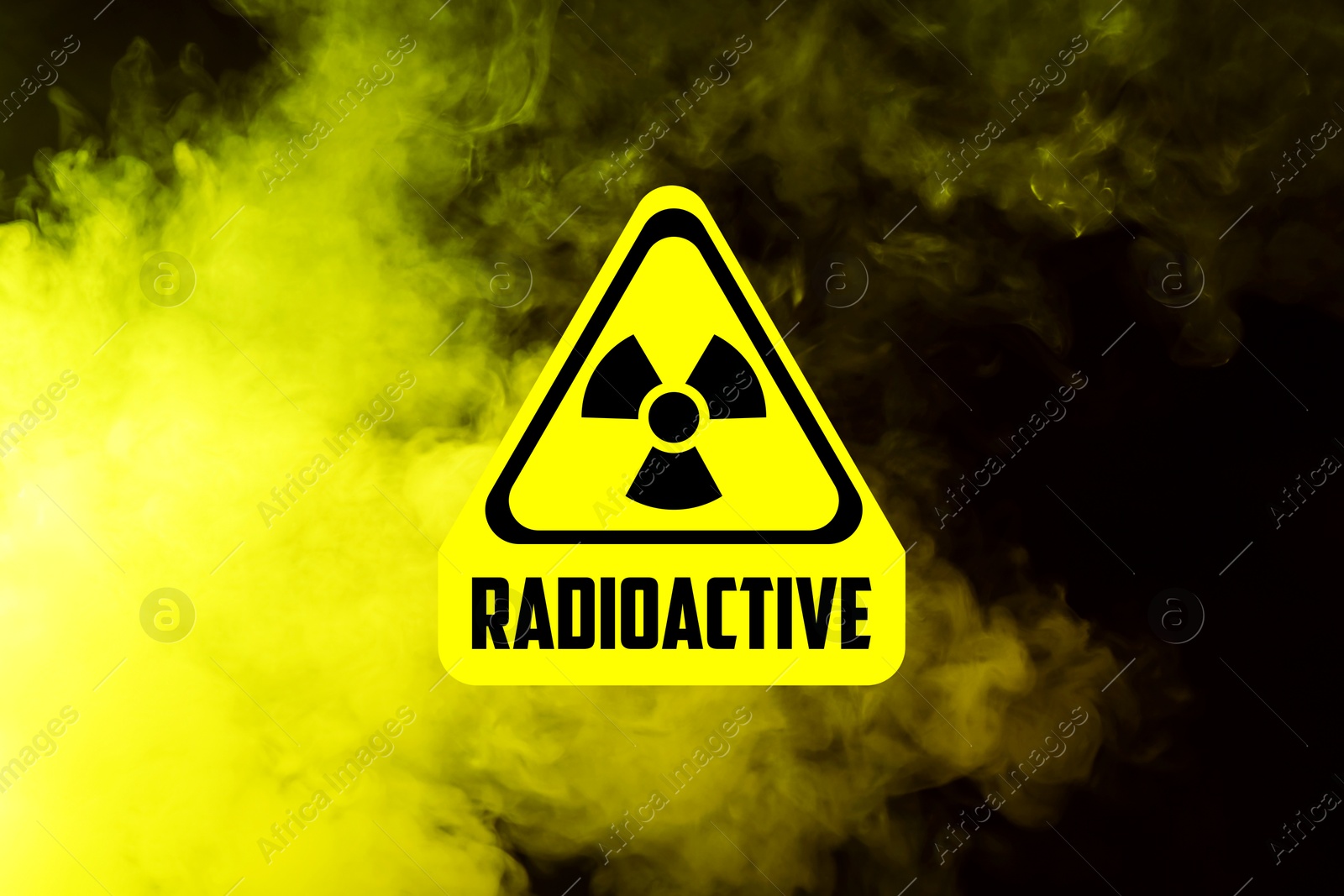 Radioactive sign and yellow toxic smoke against black background Image of Radioactive sign and yellow toxic smoke against black background