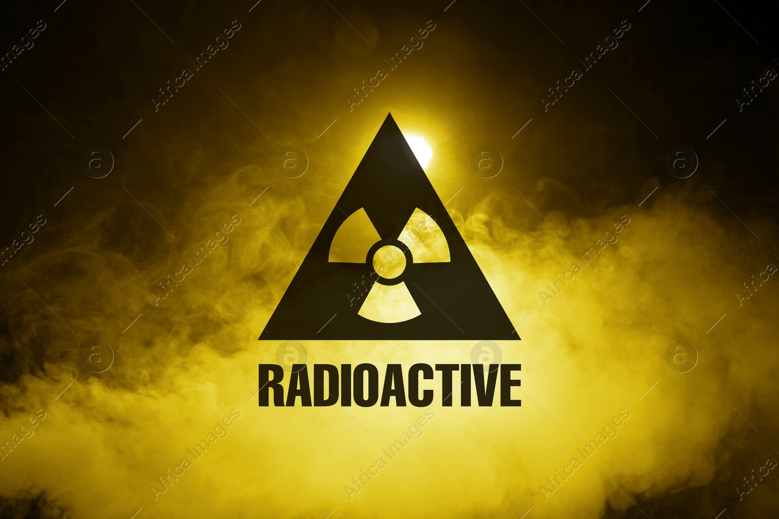 Radioactive sign and yellow toxic smoke against black background Image of Radioactive sign and yellow toxic smoke against black background