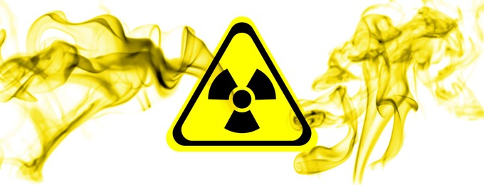 Image of Radioactive sign and yellow toxic smoke against white background. Banner design