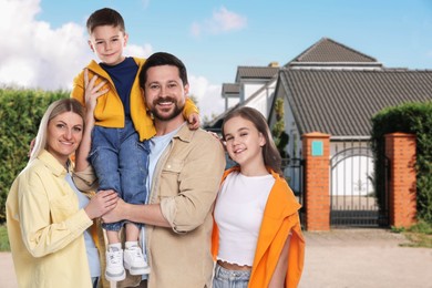 Image of Family with two kids near their house outdoors
