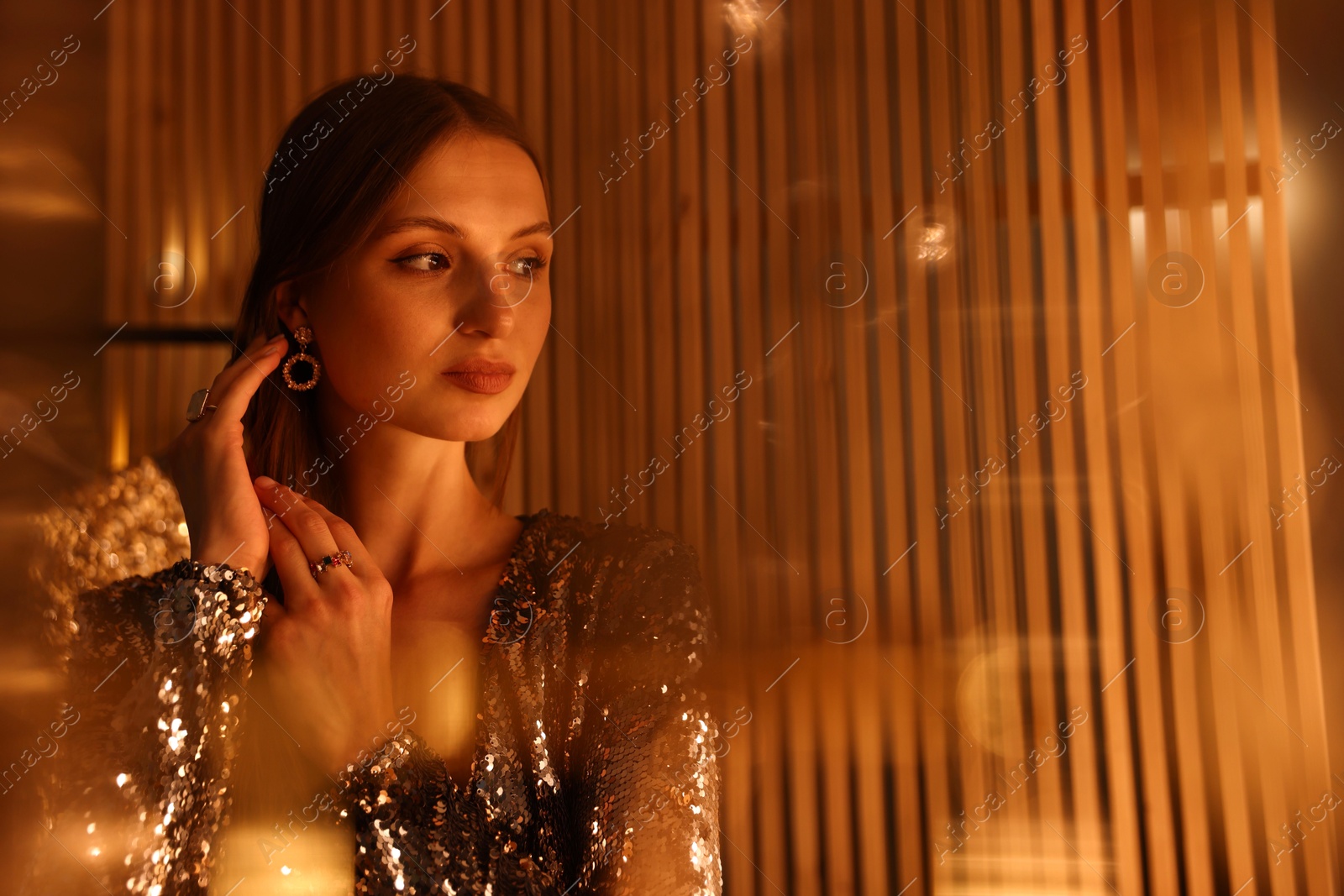 Beautiful woman getting ready indoors, space for text Photo of Beautiful woman getting ready indoors, space for text