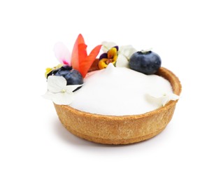 Photo of Delicious dessert. Tartlet with cream, berries and flowers isolated on white