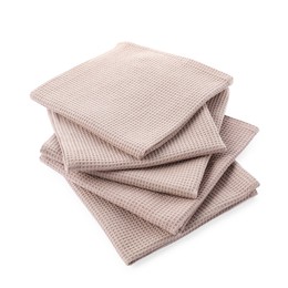 Photo of Clean stacked waffle towels isolated on white