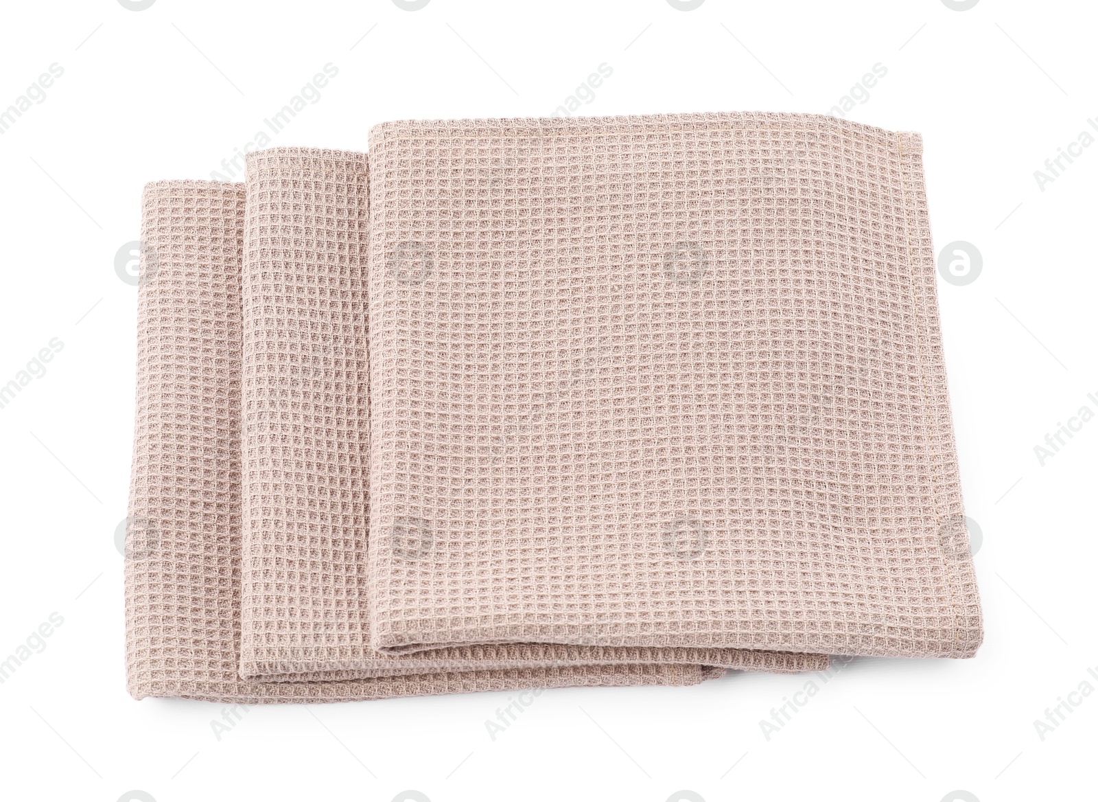 Photo of Clean stacked waffle towels isolated on white, top view