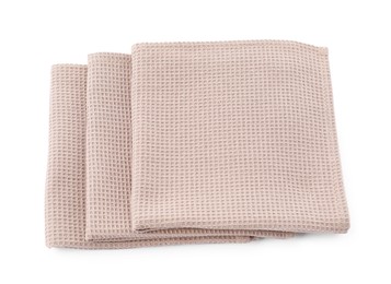 Photo of Clean stacked waffle towels isolated on white, top view