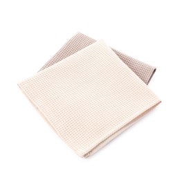 Photo of Clean stacked waffle towels isolated on white