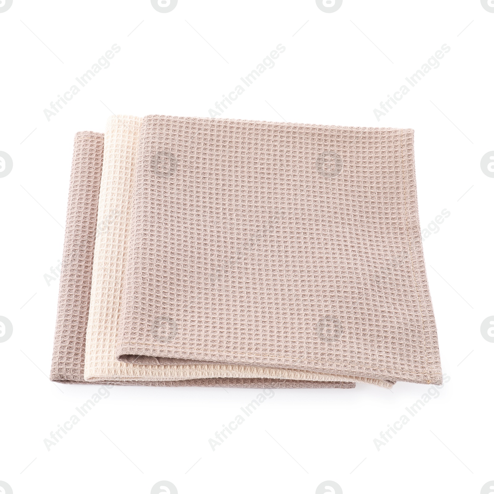 Photo of Clean stacked waffle towels isolated on white
