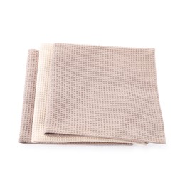 Photo of Clean stacked waffle towels isolated on white