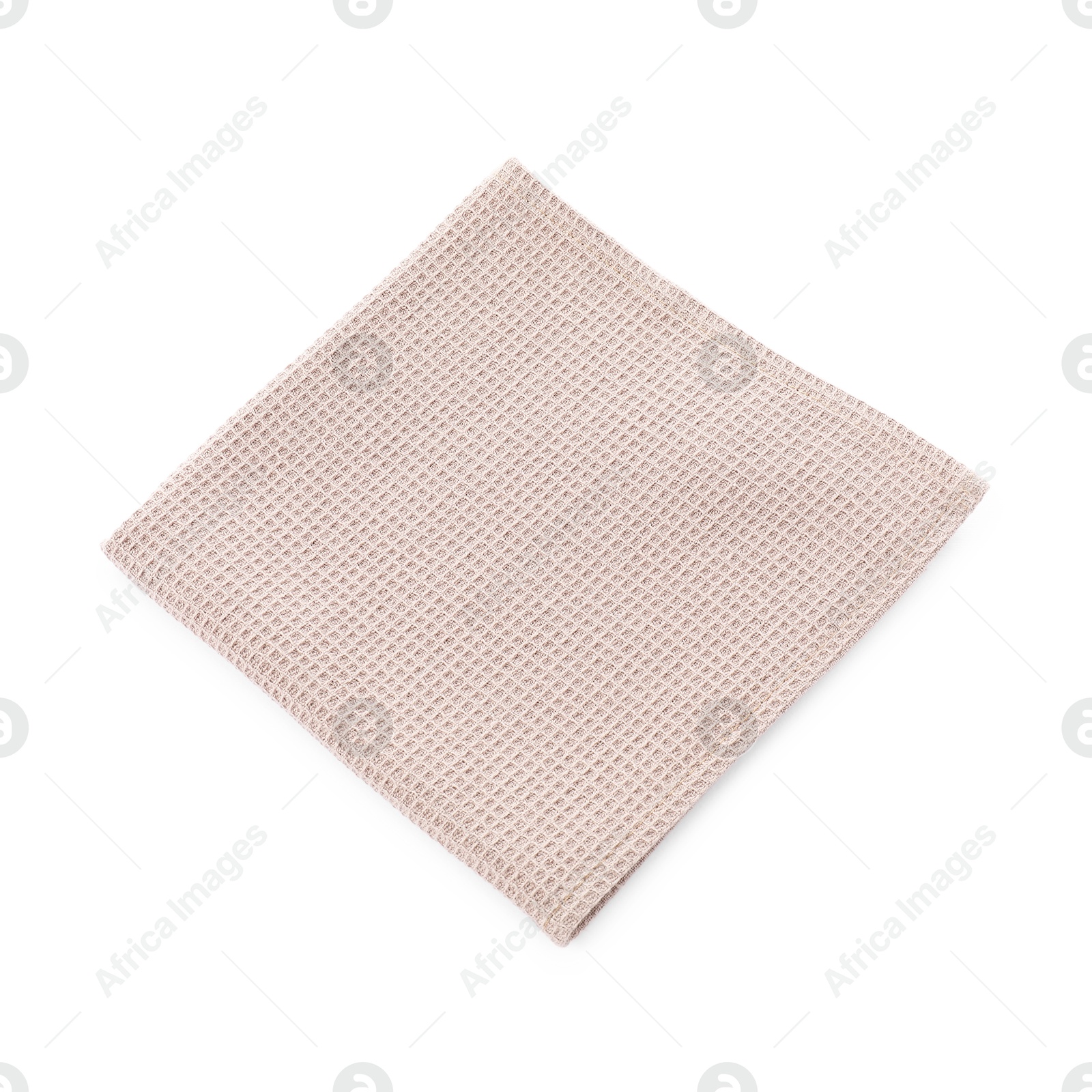 Photo of Clean beige waffle towel isolated on white, top view
