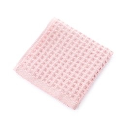 Photo of Clean pink waffle towel isolated on white, top view