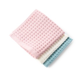 Photo of Clean colorful waffle towels isolated on white, top view