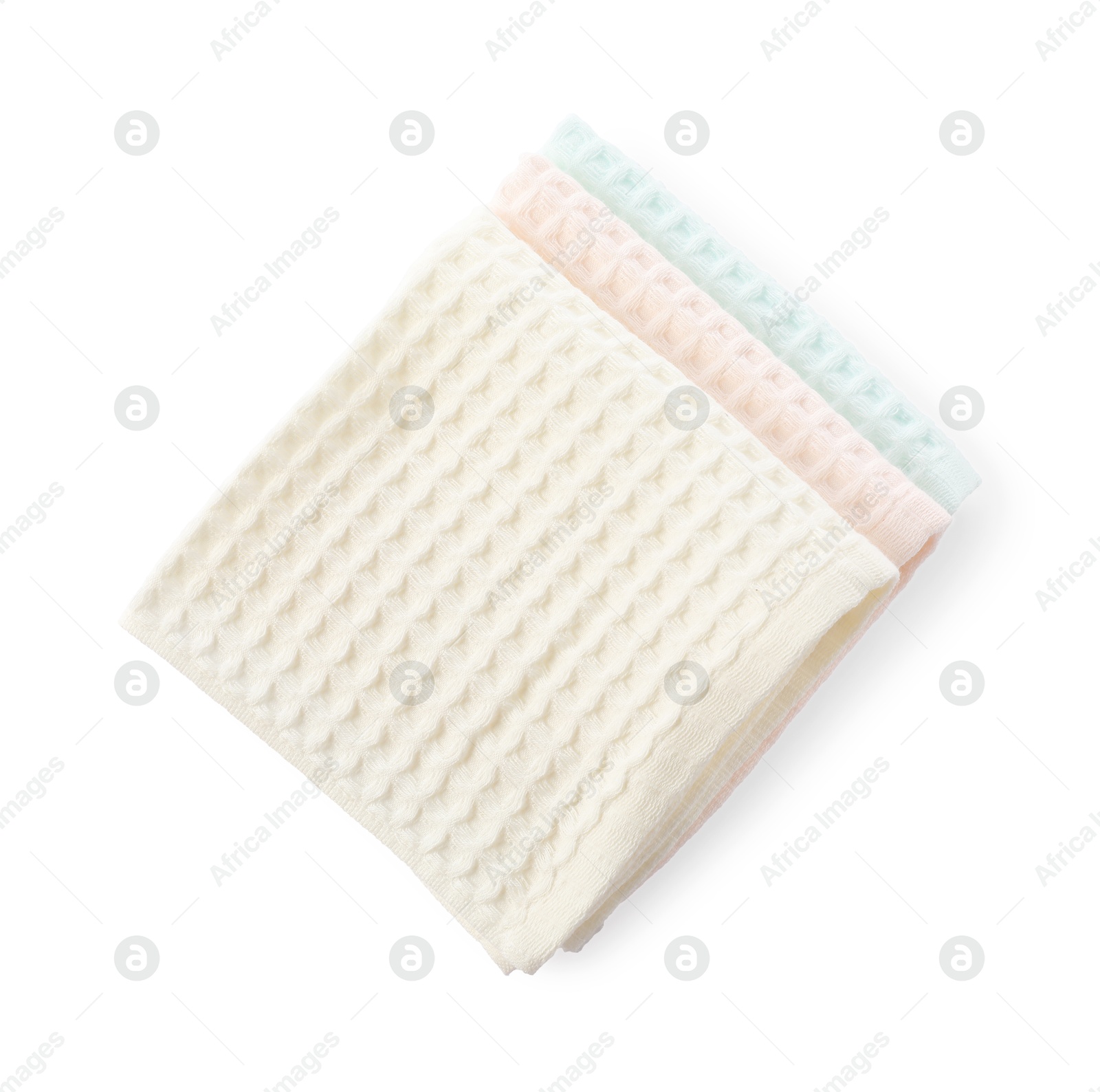 Photo of Clean stacked waffle towels isolated on white, top view