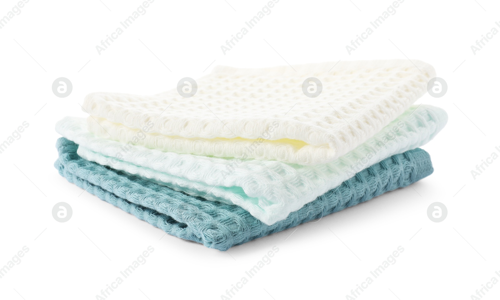 Photo of Clean colorful waffle towels isolated on white