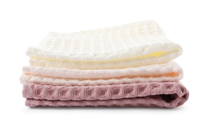 Photo of Clean colorful waffle towels isolated on white