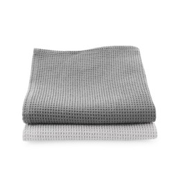 Photo of Clean stacked waffle towels isolated on white