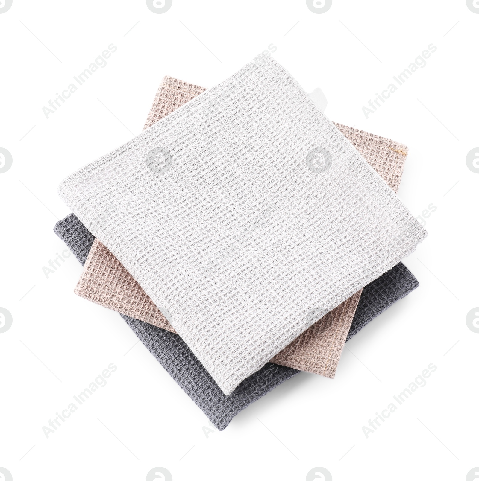 Photo of Clean colorful waffle towels isolated on white, top view