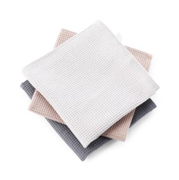 Photo of Clean colorful waffle towels isolated on white, top view