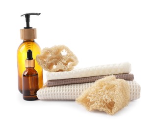 Photo of Spa composition with waffle towels and cosmetic products isolated on white