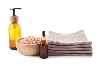 Photo of Spa composition with waffle towels and cosmetic products isolated on white