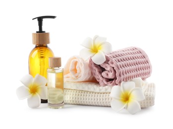 Photo of Spa composition with waffle towels and cosmetic products isolated on white