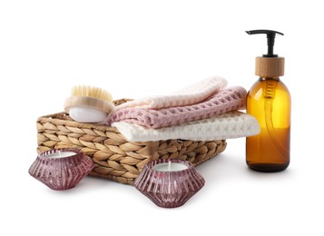 Photo of Spa composition with waffle towels and cosmetic product isolated on white