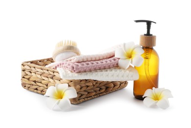 Photo of Spa composition with waffle towels and cosmetic product isolated on white