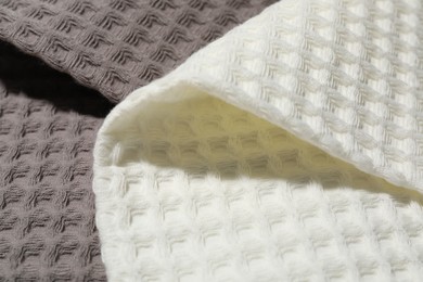 Photo of Clean waffle towels as background, closeup view