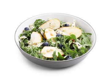 Photo of Tasty salad with arugula, pear, blue cheese, peanuts and blueberries in bowl isolated on white