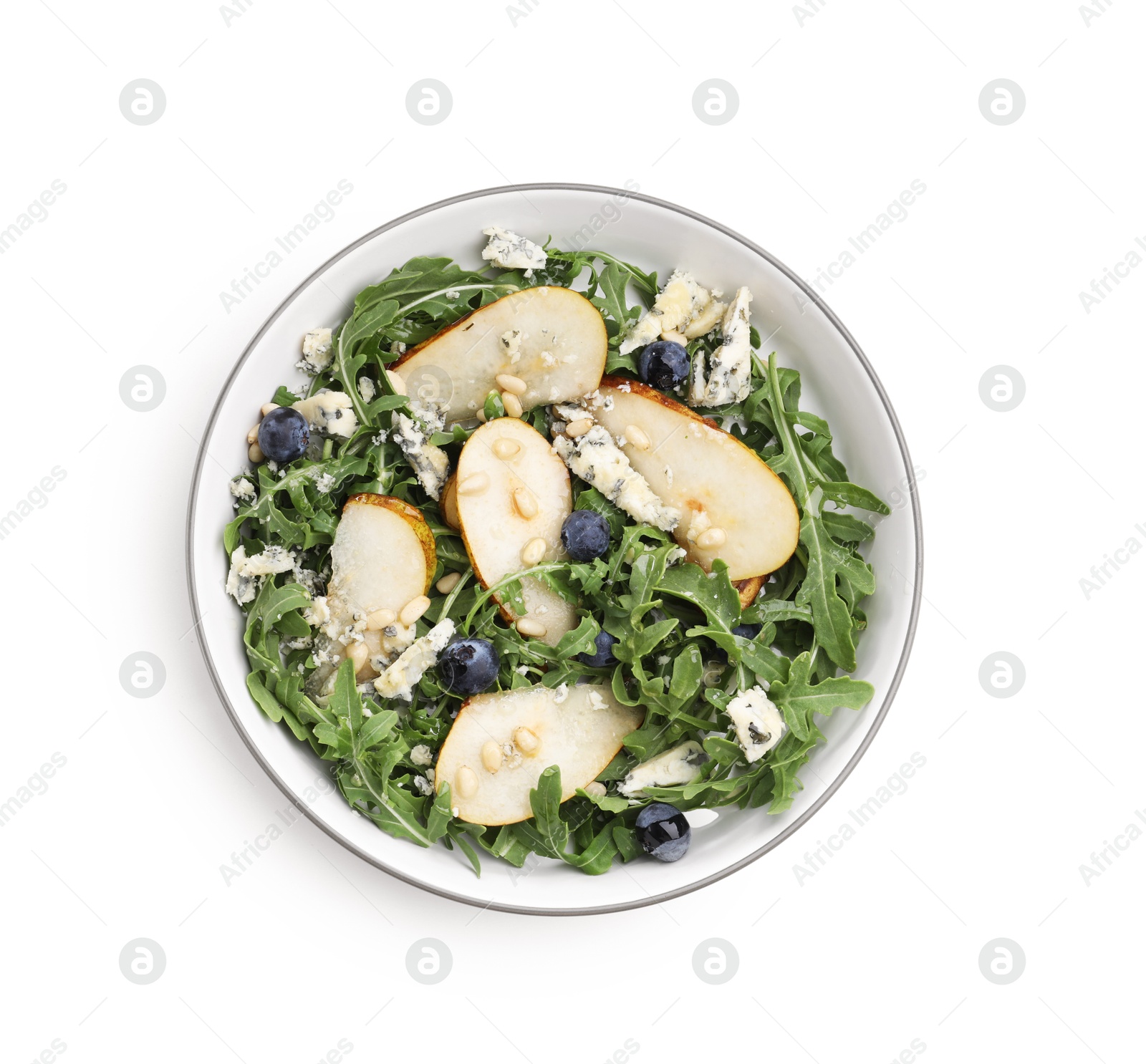 Tasty salad with arugula, pear, blue cheese, peanuts and blueberries in bowl isolated on white, top view Photo of Tasty salad with arugula, pear, blue cheese, peanuts and blueberries in bowl isolated on white, top view