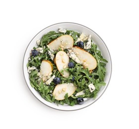 Photo of Tasty salad with arugula, pear, blue cheese, peanuts and blueberries in bowl isolated on white, top view