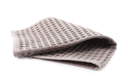Photo of Clean brown waffle towel isolated on white