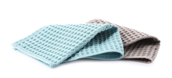 Photo of Clean colorful waffle towels isolated on white