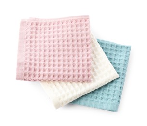 Photo of Clean colorful waffle towels isolated on white, top view