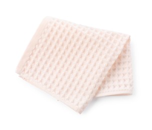 Photo of Clean pink waffle towel isolated on white, top view