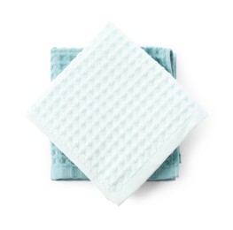 Photo of Clean stacked waffle towels isolated on white, top view