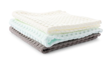 Photo of Clean colorful waffle towels isolated on white