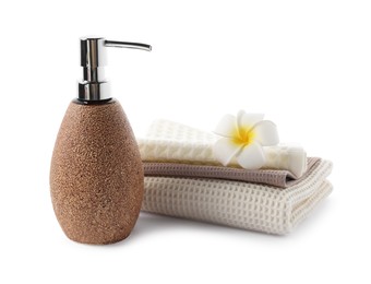 Photo of Spa composition with waffle towels and cosmetic product isolated on white