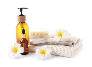 Photo of Spa composition with waffle towels and cosmetic products isolated on white