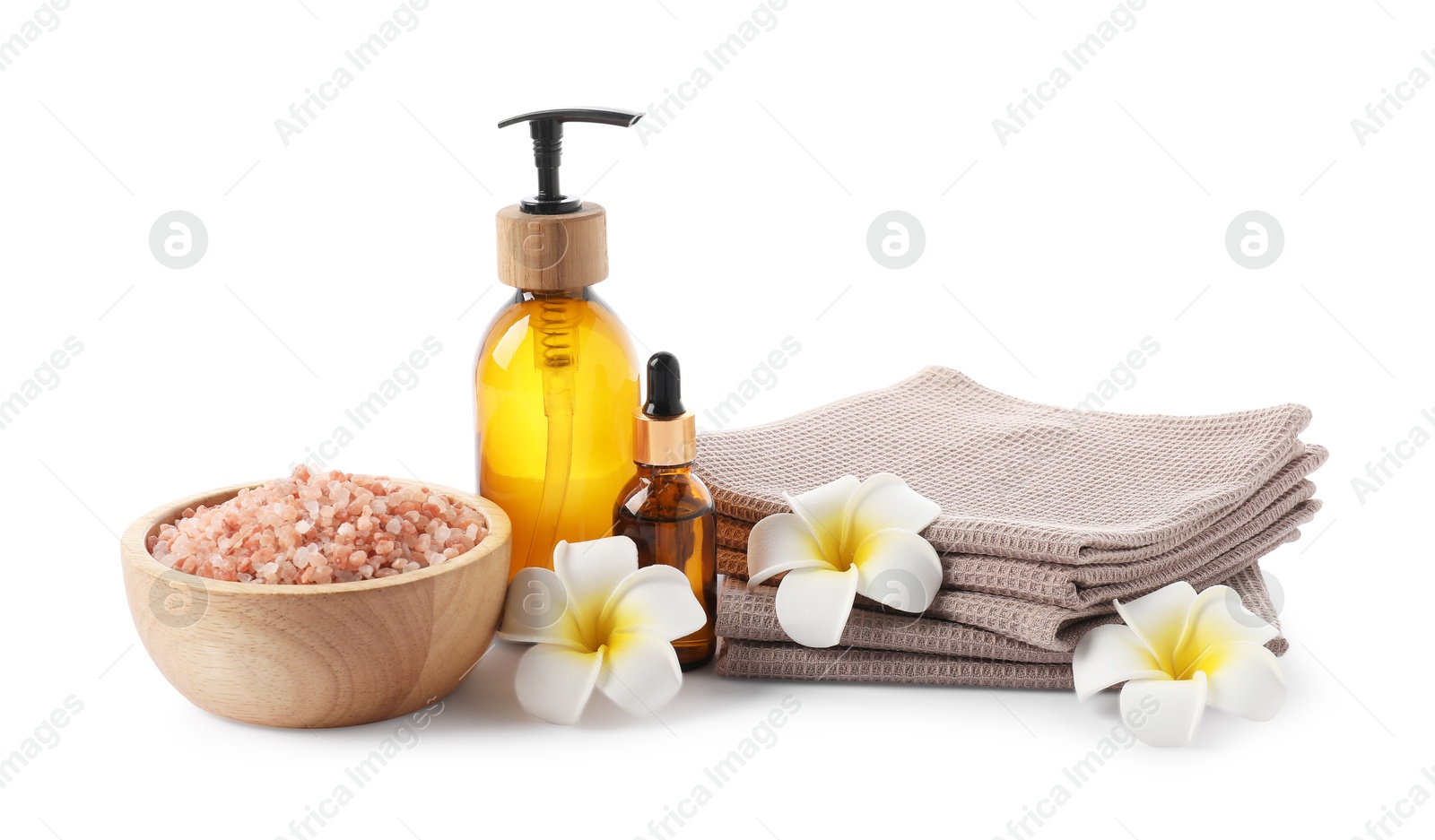 Photo of Spa composition with waffle towels and cosmetic products isolated on white