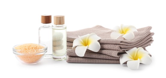 Photo of Spa composition with waffle towels and cosmetic products isolated on white