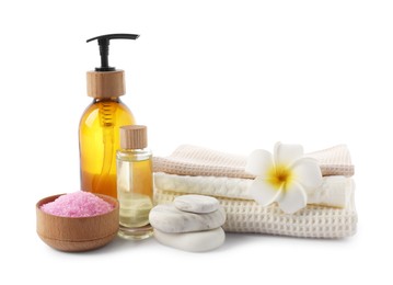 Photo of Spa composition with waffle towels and cosmetic products isolated on white