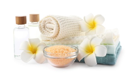 Photo of Spa composition with waffle towels and cosmetic products isolated on white