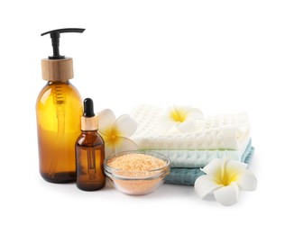 Photo of Spa composition with waffle towels and cosmetic products isolated on white