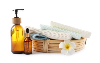 Photo of Spa composition with waffle towels and cosmetic products isolated on white