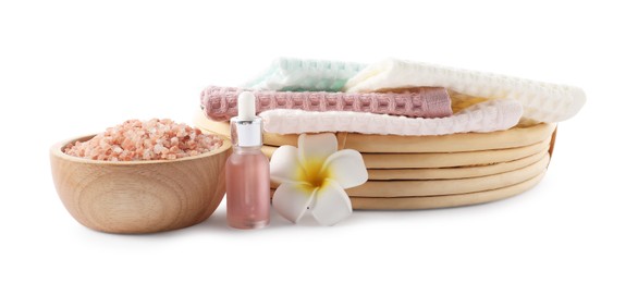 Photo of Spa composition with waffle towels and cosmetic product isolated on white