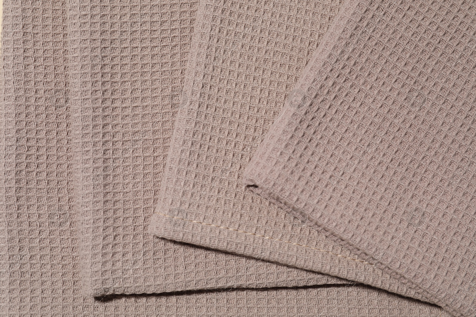 Photo of Clean waffle towels as background, top view