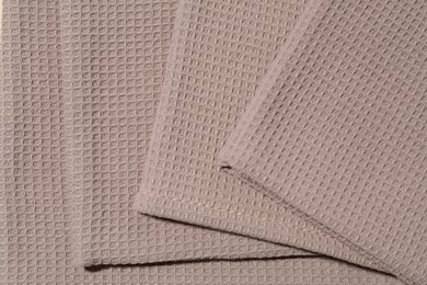 Photo of Clean waffle towels as background, top view