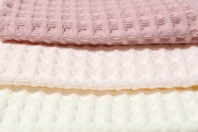 Photo of Clean waffle towels as background, closeup view