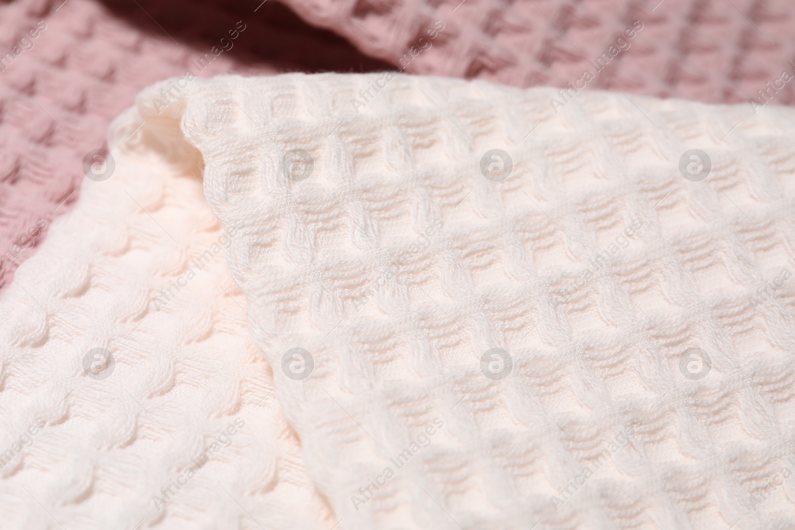 Photo of Clean waffle towels as background, closeup view
