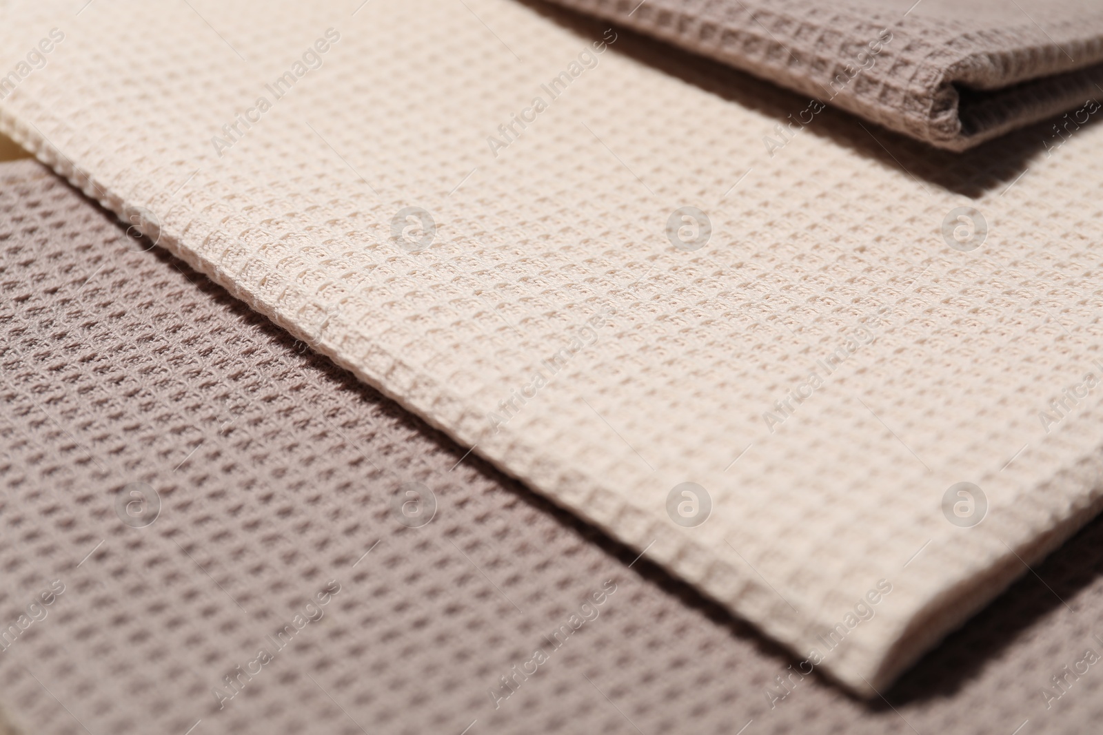 Photo of Clean waffle towels as background, closeup view